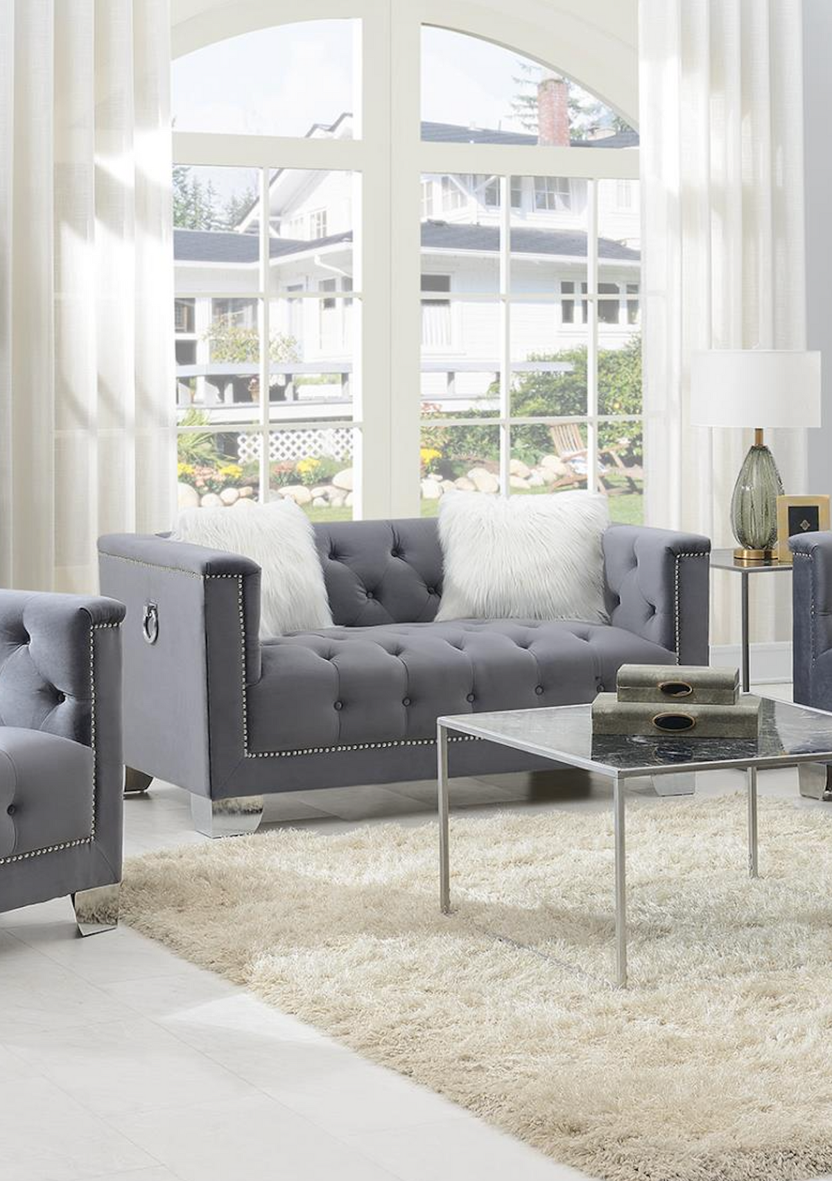 Gray Loveseat W/Two White Fur Pillows